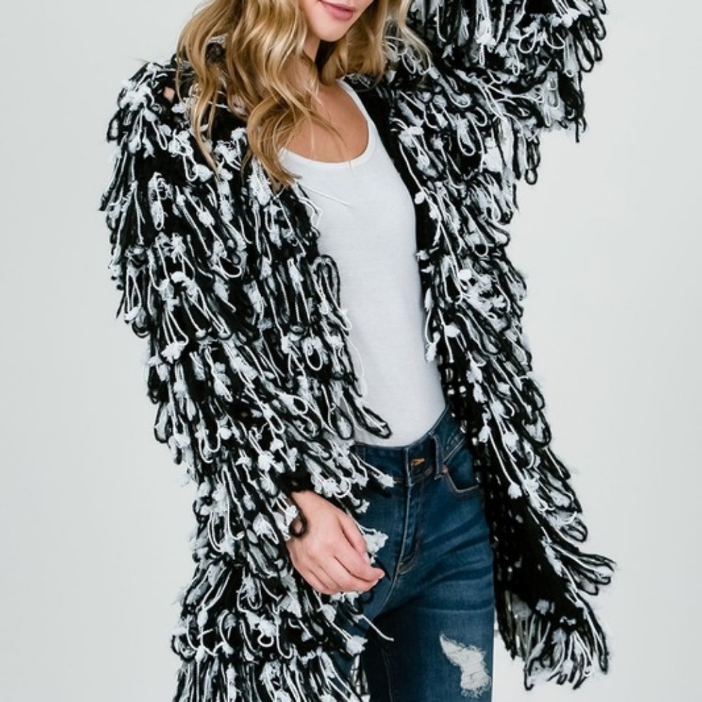 Loopy and or Ribbon cut sweater.  AMAZING STYLE